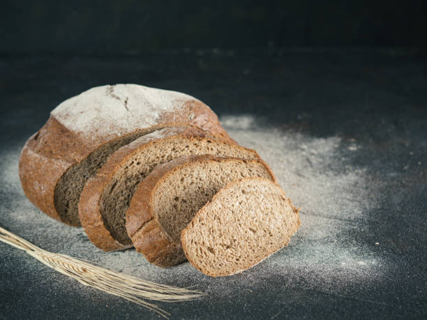 istock Sliced homemade sourdough rye bread, copy space 888107034