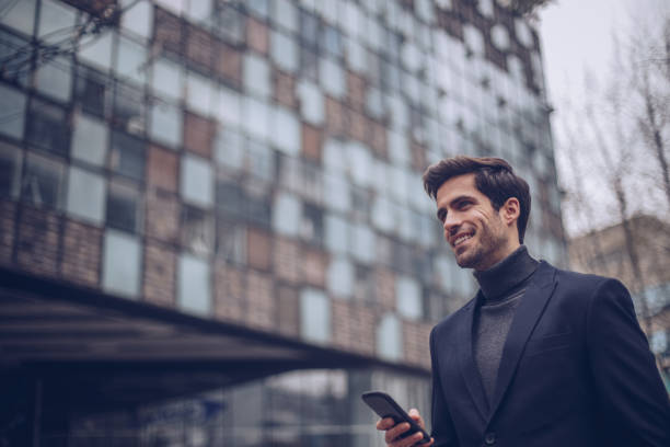 istock Elegant gentleman outdoors 888110162