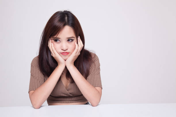 istock Asian girl with sad emotion. 888112954