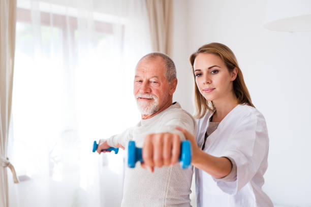 istock Health visitor and senior man during home visit. 888116562