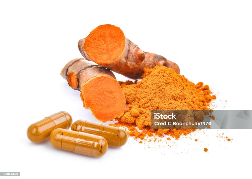 turmeric root and powder with turmeric capsules isolated on white background Capsule - Medicine Stock Photo