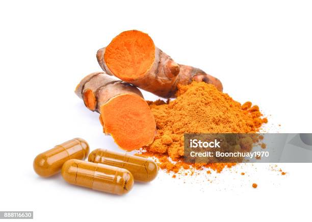 Turmeric Root And Powder With Turmeric Capsules Isolated On White Background Stock Photo - Download Image Now