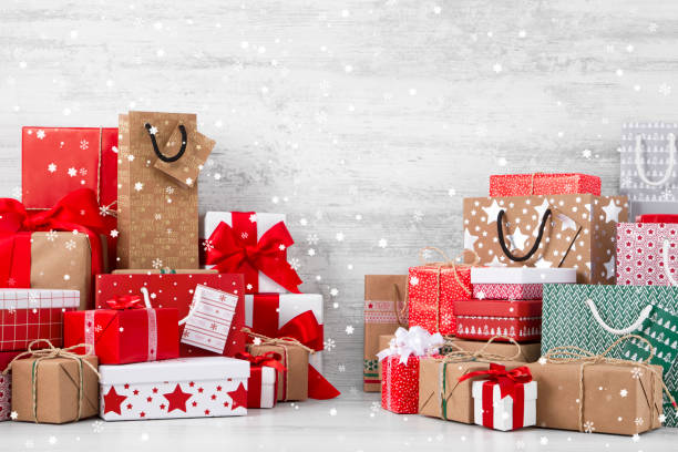 istock Christmas Gifts on Snowy Background 888117262