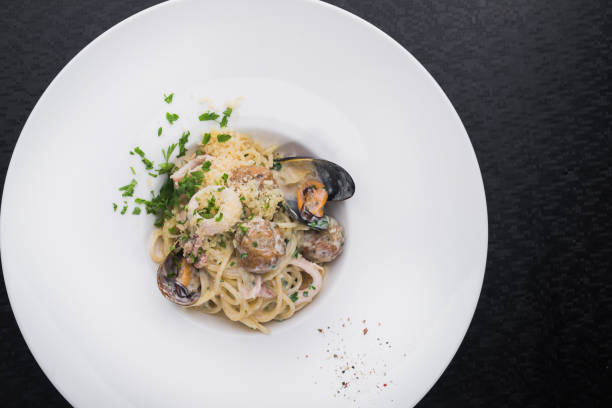 istock seafood pasta with squid and mussels 888119828