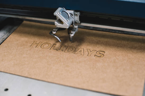 istock Industrial laser engraving word 