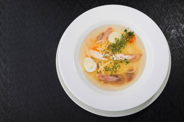 istock tasty chicken soup with noodles 888120226
