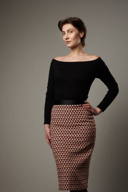 istock Young woman with arm to hip 888124564