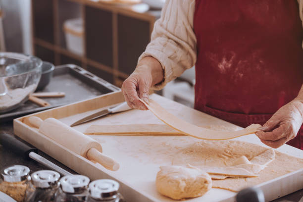 istock Close-up of person preparing dough 888132538