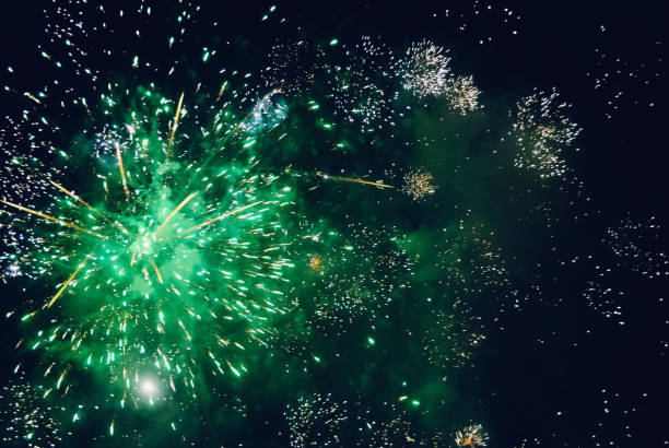 istock Explosion of diverse fireworks against the night sky 888133624