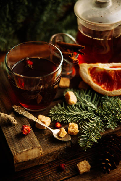 istock hot pink tea with cinnamon in a transparent mug, rustic style 888151034