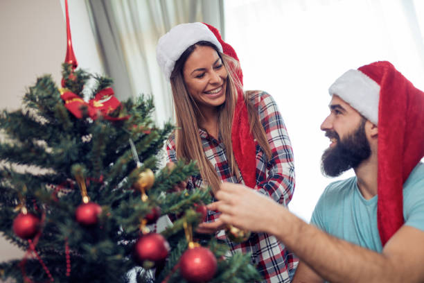 istock Couple celebrating Christmas together 888151100