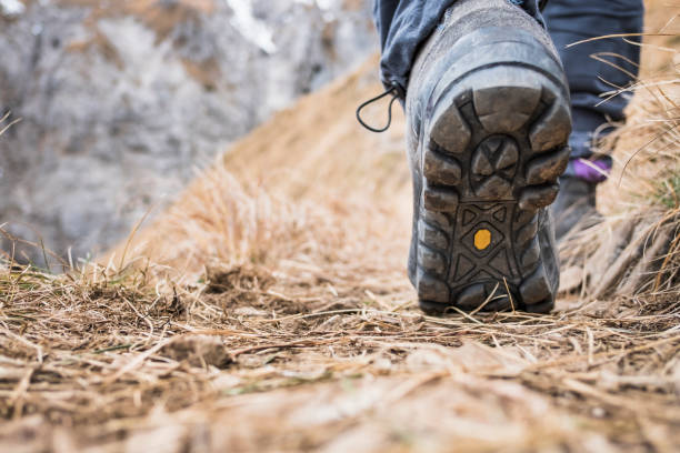 istock Hiker walks on Mountain Trail 888153908
