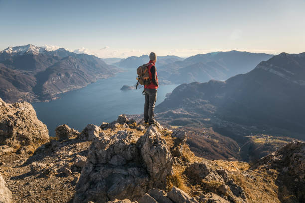 istock Hiker alone on top of the mountain 888153920