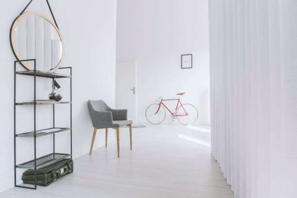 istock Grey chair in minimalist corridor 888158212