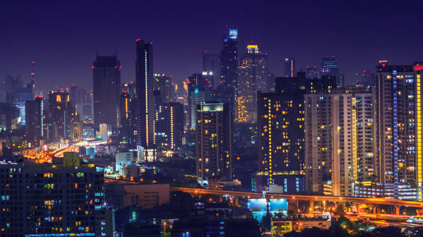 istock City with tower and temple at night 888167376