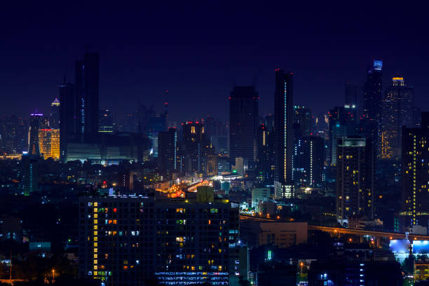 istock City with tower and temple at night 888167458