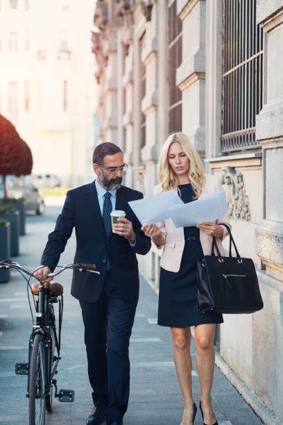 istock Business people going on or off to work 888172850