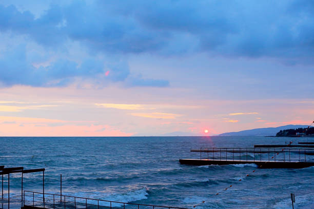 Sea or ocean beach, a pier, colorful view, vacation time, summer.
