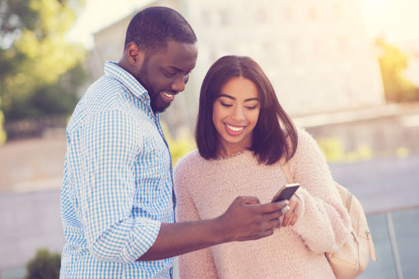 istock Delighted positive man shoving a picture 888183616