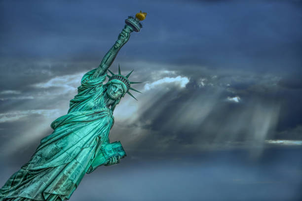 istock Statue of Liberty, New York, Cloudy sky background 888186814