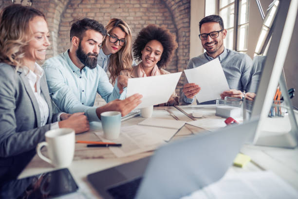 istock Group of young designers working on a new project 888186928