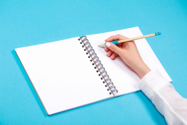 istock Spiral notepad with pencil as mockup for design 888188308