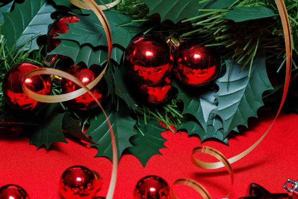 istock Christmas red balls, tinsel on a red background. 888200854
