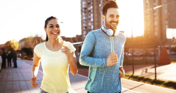 istock Couple jogging outdoors 888215512