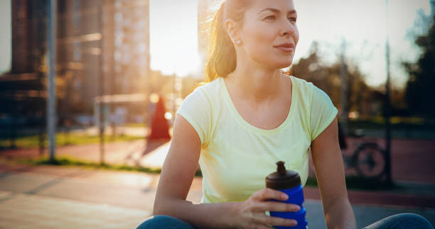 istock Beautiful female jogger tired after running 888218888