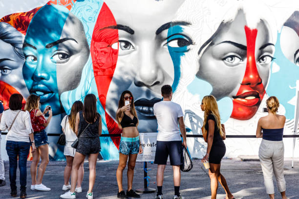 Wynwood District, in Miami, preparing for Art Basel. These photos were taken the weekend before the fair, while the graffiti artists worked on the walls and the crowd watched the process as it became part of it.