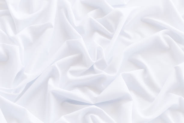 istock White cloth background and texture, Crumpled of white fabric abstract 888220854