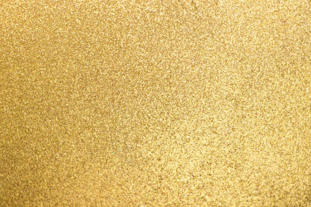 istock Closed up of metallic gold glitter textured background 888226432
