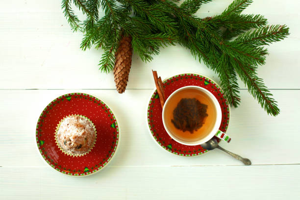 istock winter cup of tea and Christmas decorations 888236868