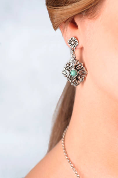 istock beautiful silver earrings with precious stone 888236898