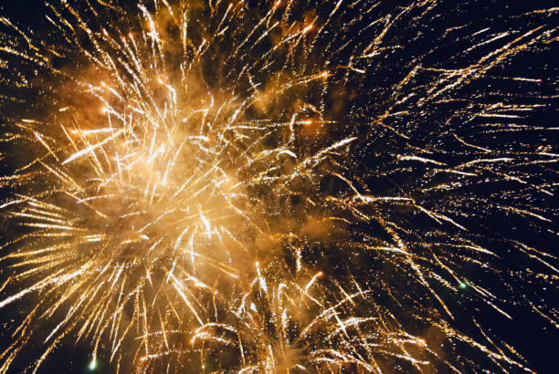 istock Explosion of fireworks against the night sky on a holiday 888237038