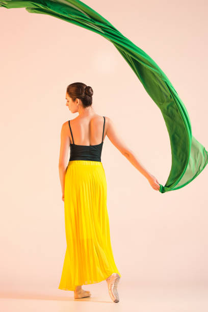 istock Young and incredibly beautiful ballerina is dancing at studio 888243622