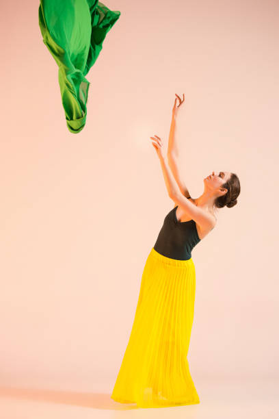 istock Young and incredibly beautiful ballerina is dancing at studio 888244540