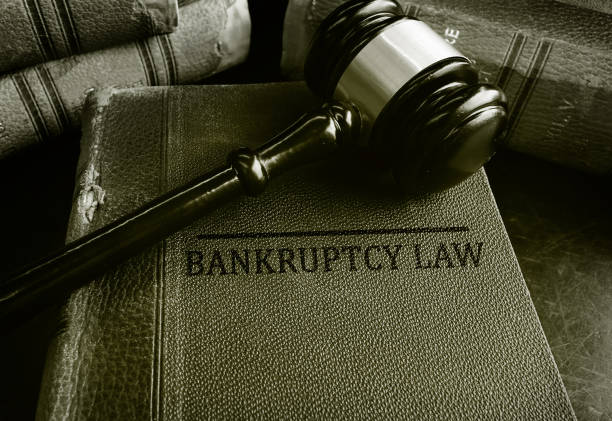 istock Gavel on Bankruptcy law books 888249710