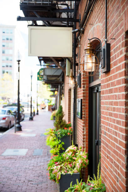 istock city street with an empty signboard 888267388