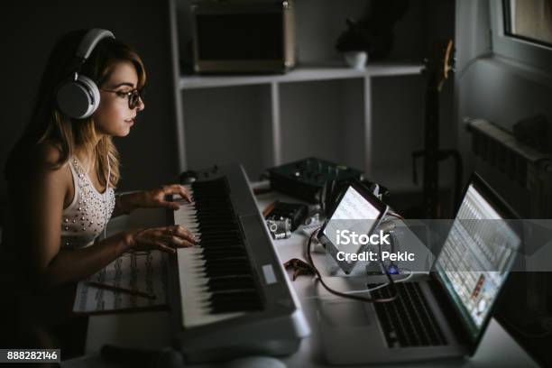 Female Musiciasn Creating Music Stock Photo - Download Image Now - Composer, Music, Domestic Life