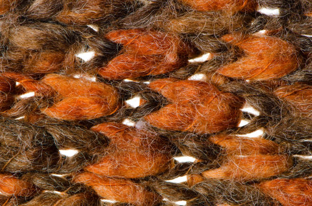istock Orange and green knitted wool 888286086