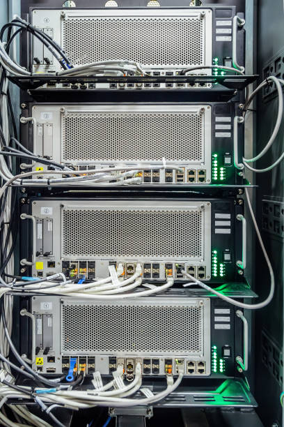 istock Cabinet with network server equipment, connected with wires. Technology background 888303462