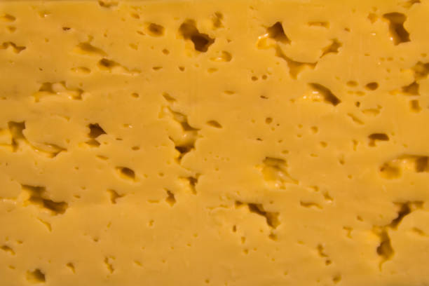 istock Texture of the cheese for background 888304176
