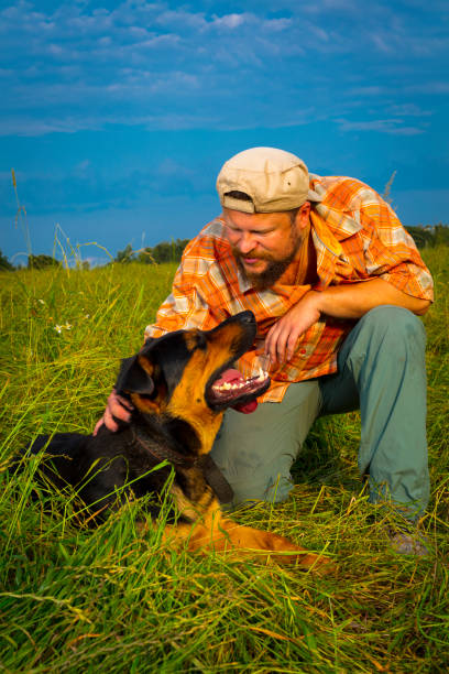 istock View of a man with his dog 888310038