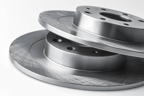 istock New car brake disc and brake linings on white background 888338618