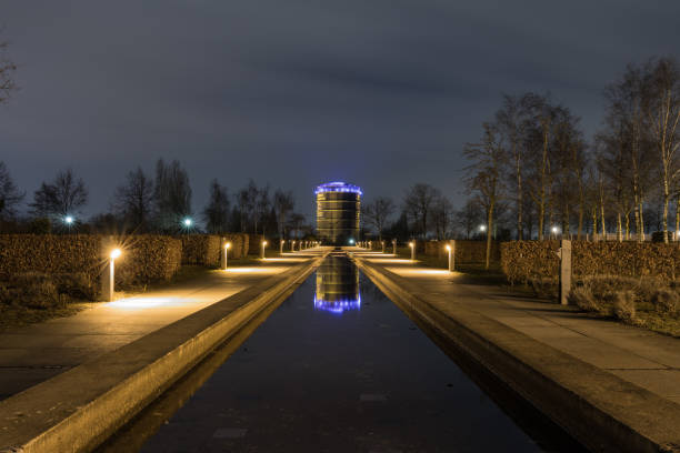 oberhausen, nrw, germany - february 21, 2017 at 7.21pm : illuminated gasometer from olga park - nightshot imagens e fotografias de stock