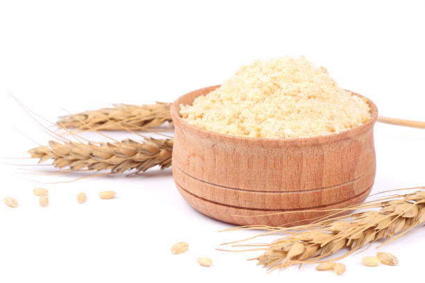 istock Bowl of breadcrumbs isolated on white 888342784
