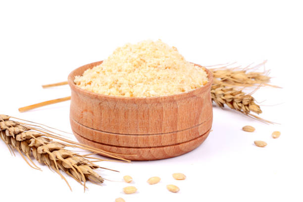 istock Bowl of breadcrumbs isolated on white 888343054