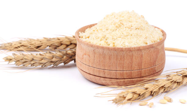 istock Bowl of breadcrumbs isolated on white 888343402