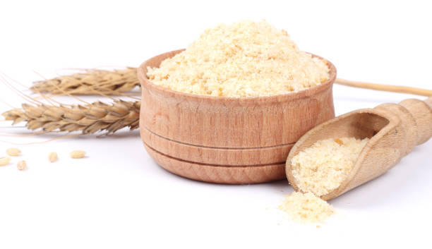 istock Bowl of breadcrumbs isolated on white 888343412